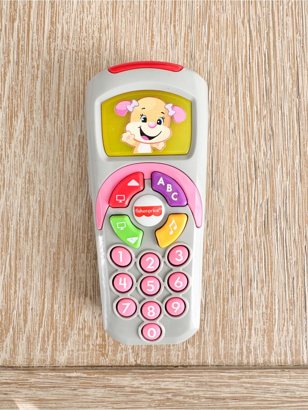 Fisher-Price Laugh & Learn Sis' Remote toy